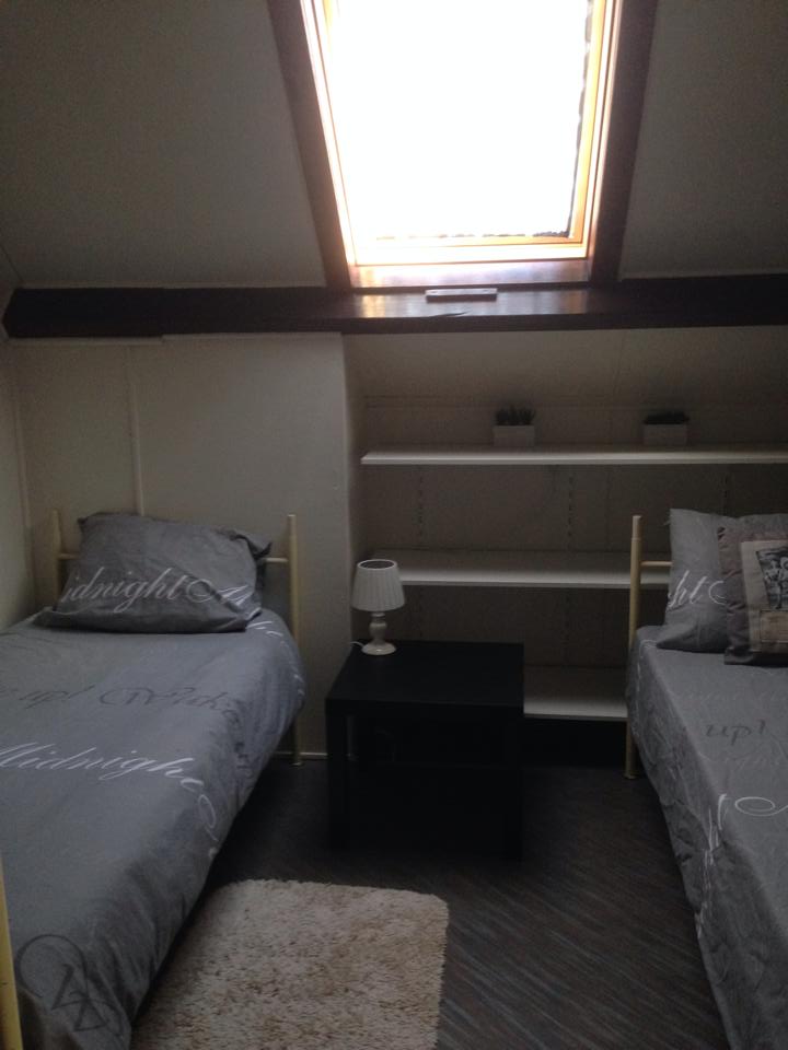 Een van slaapkamers van bed and breakfast